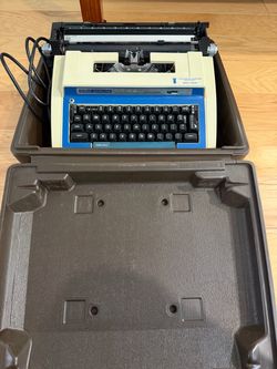 Smith-Corona Super Sterling - Electric Portable Typewriter with Case