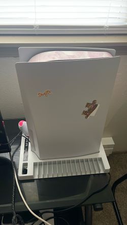 Ps5 with charging stand.