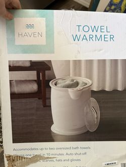 New Haven Towel Warmer. Still in box and plastic. Warms up to two oversized bath towels. Gets one towel warm in 10 minutes. Has auto shut-off. Can war