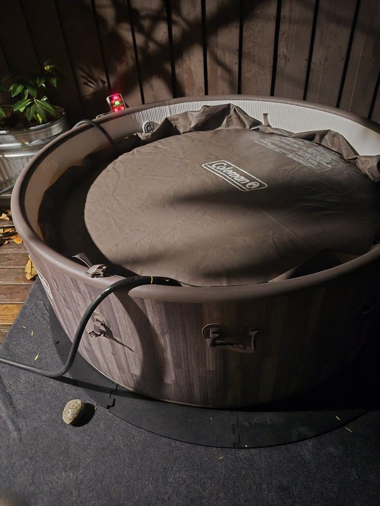 BARELY USED Coleman Saluspa Napa Airjet hot tub, Will Include Chemicals, Filters & Mat only 400$
