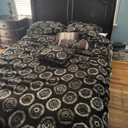 bed and mattress and side table 