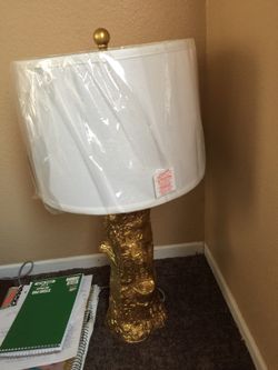 Gold tree stump lamp