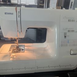 Kenmore Sewing Machine and Foot Pedal w/Accessories 