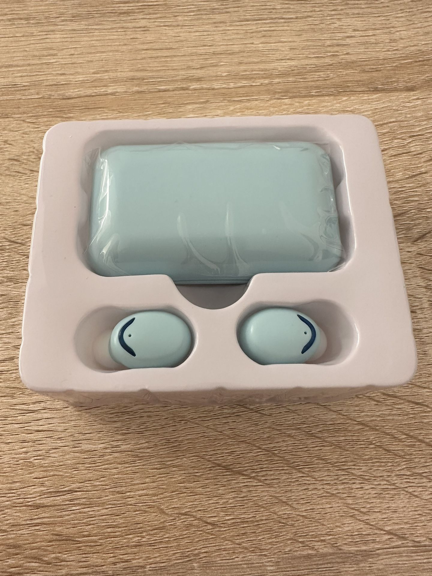 Light Blue Wireless earbud bluetooth headset headphone for both android and iphone compatible