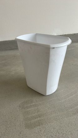 White plastic trash can