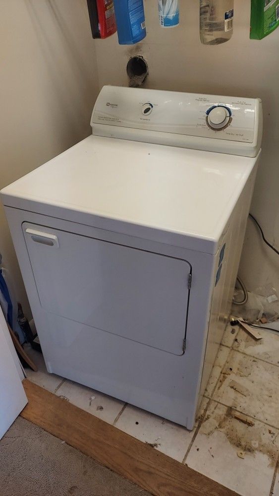 Maytag gas dryer.
Dimensions: 27W x 27D x 36T
