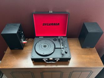 Sylvania record player, rechargeable/built in speakers, portable $20