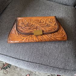 Beautiful leather purse with looks like hand carving in the leather