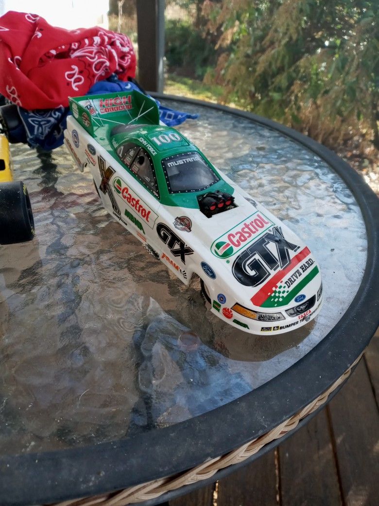 Die cast. JOHN FORCE MUSTANG