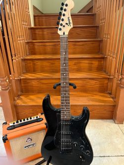 Squier Stratocaster (Mint)w/Orange Crush 12 Amp