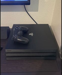 Sony PS4 Pro 1TB – Excellent Condition + Controller