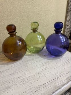 3 colorful bottles