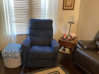 Two blue lazy recliners, one is also a rocker