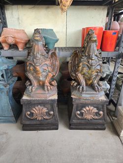 CONCRETE ENTRY GARGOYLE STATUES ON A PEDESTAL $850 A SET OF 2 (OVERALL HEIGHT 52" INCHES)