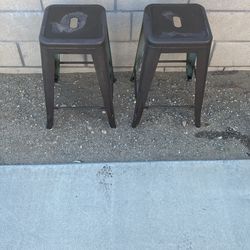 2 bronze stools