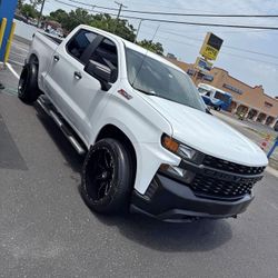 Si 