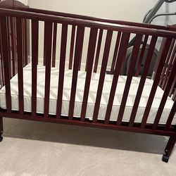 Dream On Me  brand full size folding crib with mattress