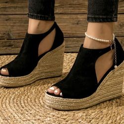 Woman’s Espadrille Peep Toe Wedge