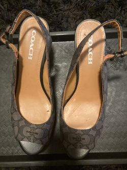 MICHEAL KORS MONOGRAM WEDGE HEEL $10 -IF AD IS UP IT IS AVAILABLE