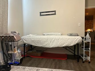 Massage table
