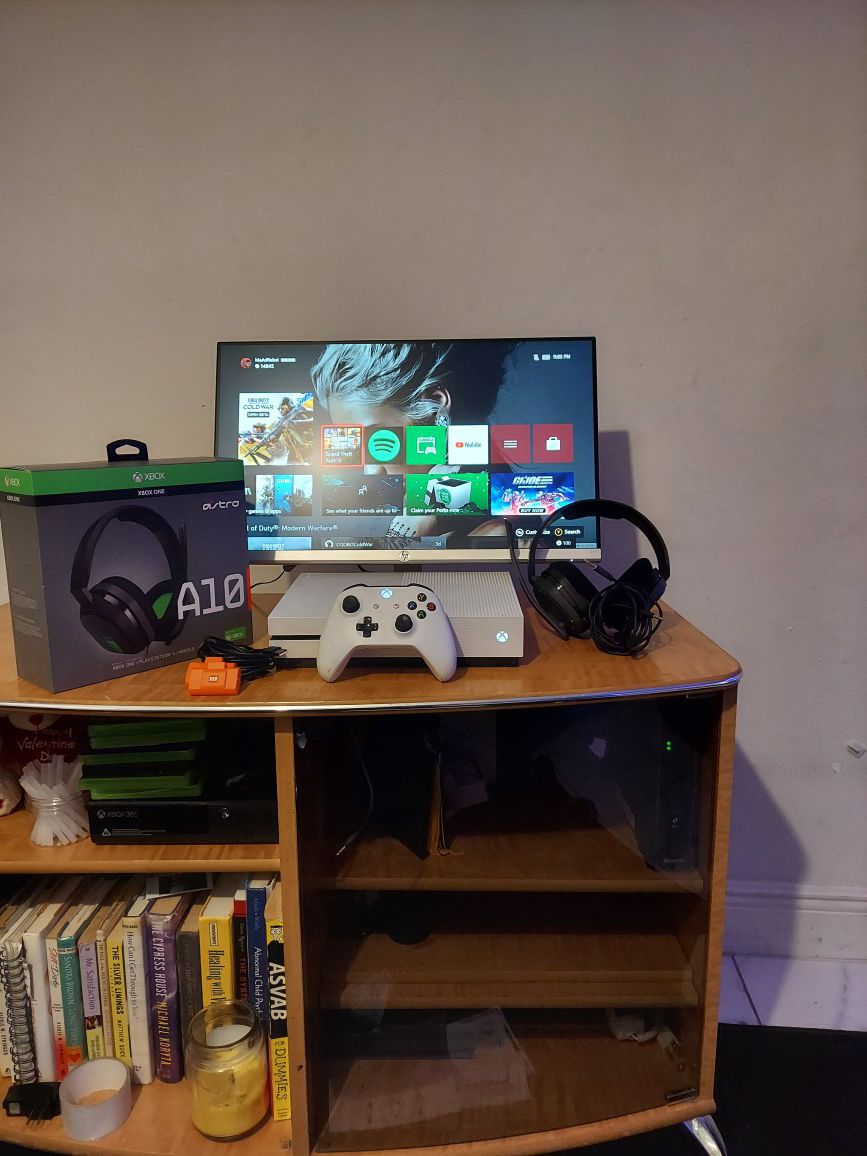 Xbox one s 700 GB, Astro A10 Headset, HP 28" 70 Hz refresh monitor, Charge and play kit.