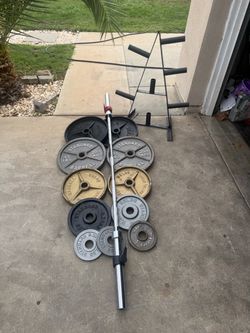 Olympic weights 315lbs total plus 7ft 40lbs bar plus weights tree