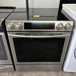 SAMSUNG 31” SLIDE IN ELECTRIC STOVE