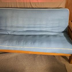Futon With A Very Thick Mattress And Covers