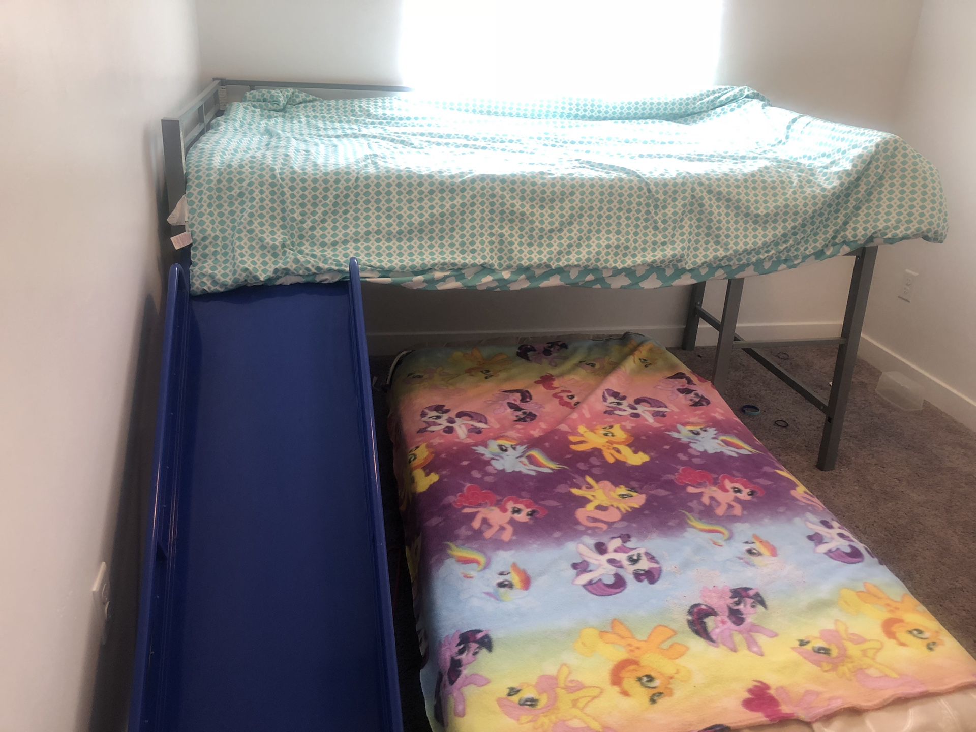 Bunk bed with slide. Has protective bar and ladder. Sturdy and great shape.