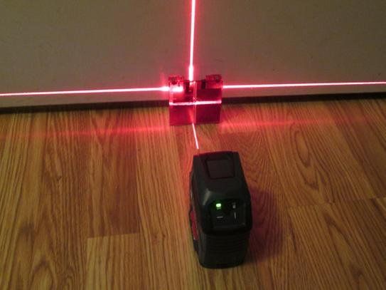 Bosch cross line laser level and Ridgid Tile Saw with blade And Tile Cutter