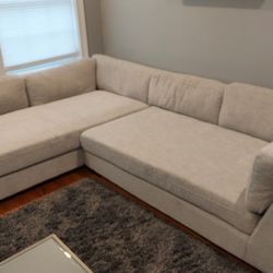 L-Shaped large 2 piece sectional sofa. HomeSense 
8ft x 10ft x 4ft deep - 28" tall
- Transport Available 