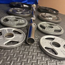 NEW Olympic Equipment Curl Bar of 20# with Cooper Bearings and Plates 2X35s, 2X25s, 2X10s and 2X5s pounds. Brute 170#