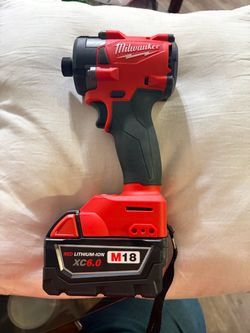 Milwaukee M18 impact driver XC6.0 with charger