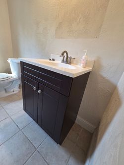 Brown Vanity, coutersink, faucet