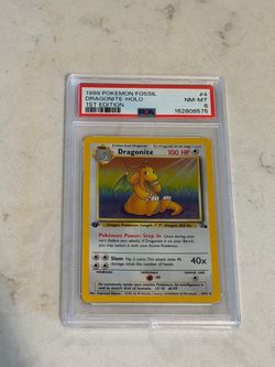 1999 Pokemon Fossil 1st Edition Dragonite-Halo PSA 8