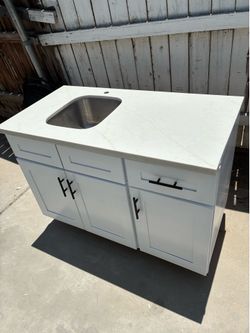 Cabinet with sink and quartz