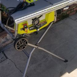 Ryobi 10in table saw with rolling folding stand 