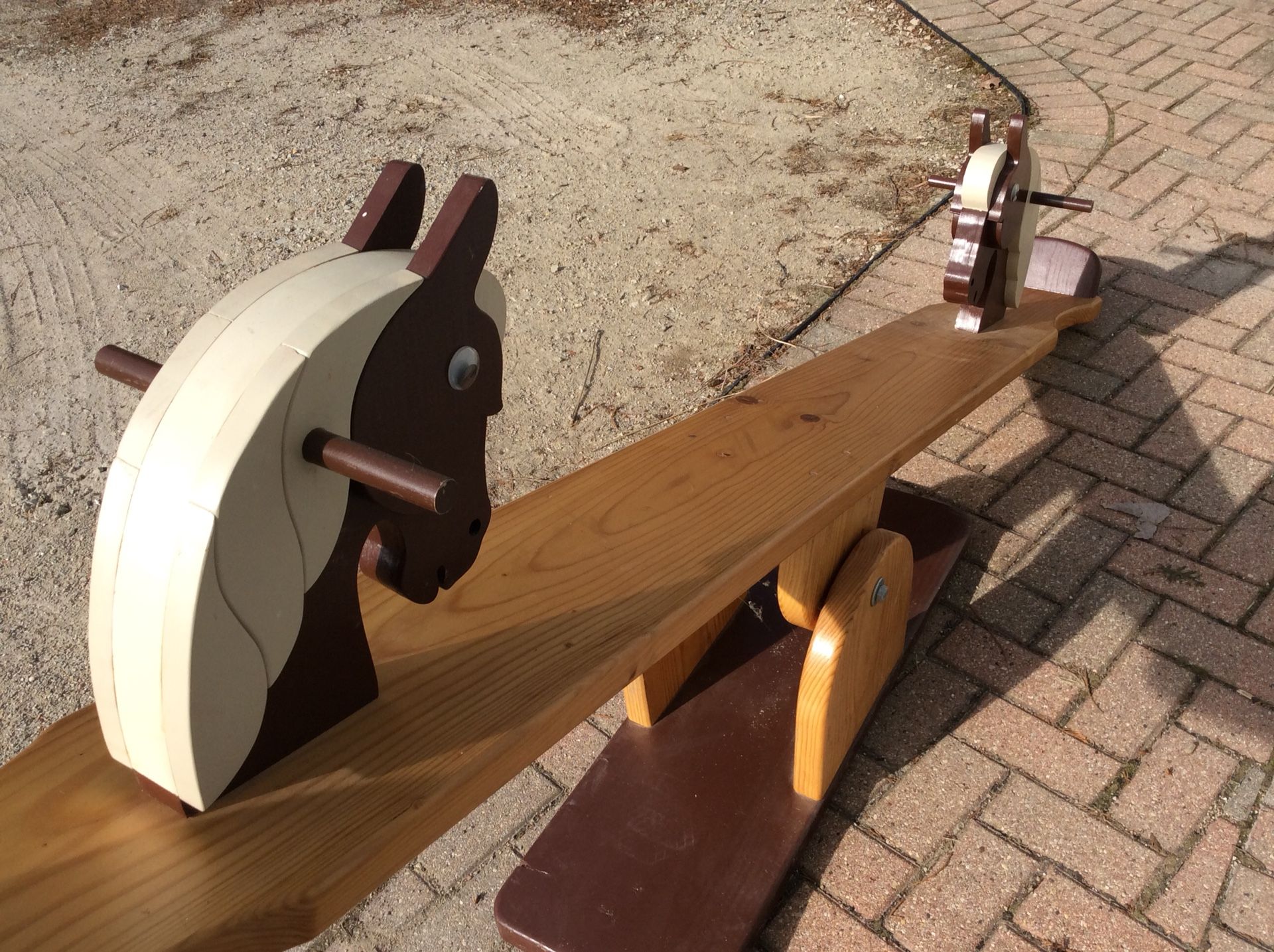 Handcrafted child’s horse teeter totter
