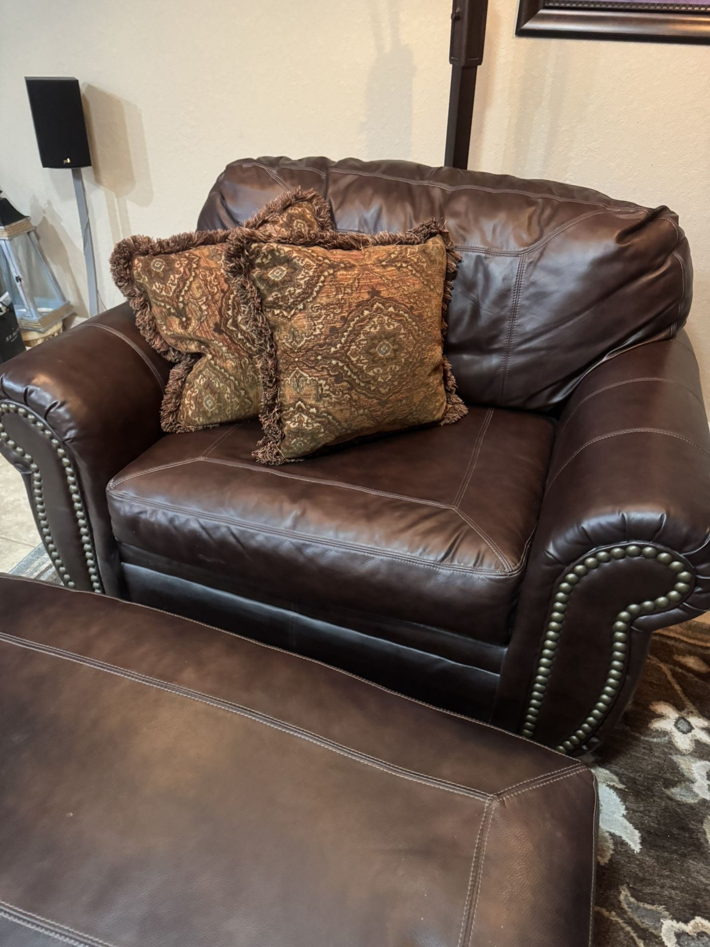 Leather oversize chair And Hasek