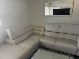 LEATHER COUCH WITH LEATHER /GLASS TABLE