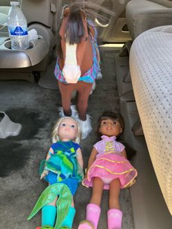 2 American girls dolls and horse.