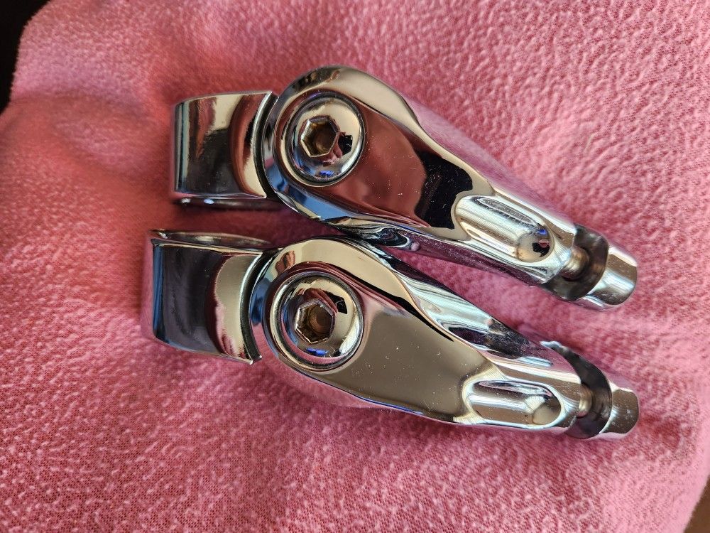 Harley Chrome Highway Foot Peg Clamps.