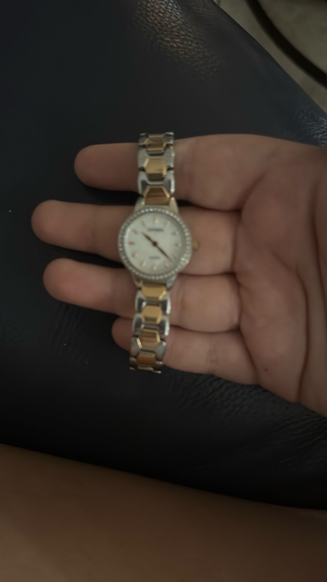 Golden and diamond woman’s watch