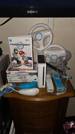 Nintendo Wii Mario Kart Bundle with 7 Games