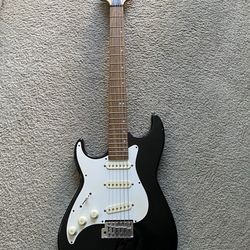 left-handed Greg Bennett Malibu Signature Series electric guitar