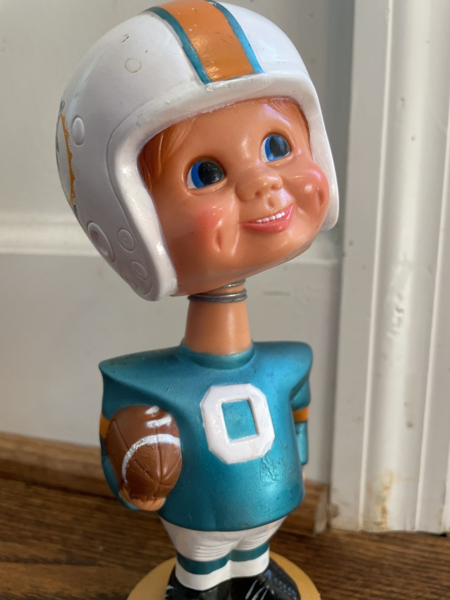 Vintage 1975 Miami Dolphins 7.5" NFL Bobblehead Sports Specialties Corp Football. Condition is pre owned and naturally shows signs for wear from age a