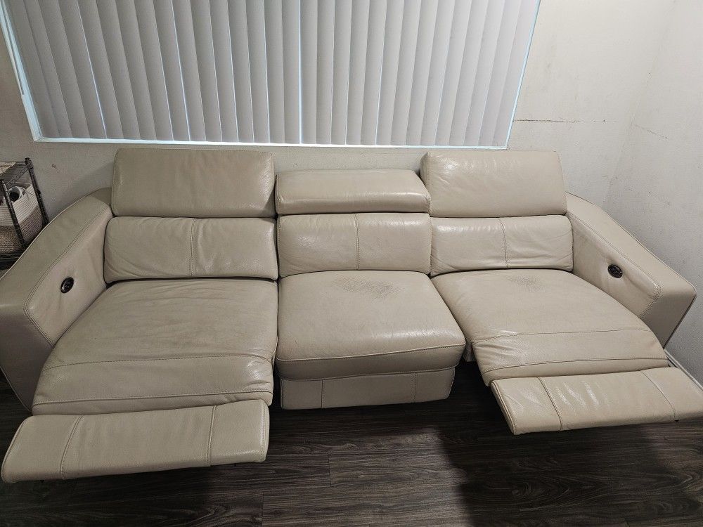 Beige Leather Sofa, Retractable. Very Comfortable.