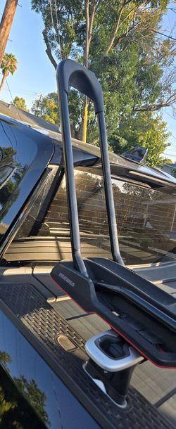 Rivian racks and 2 Yakima bike racks