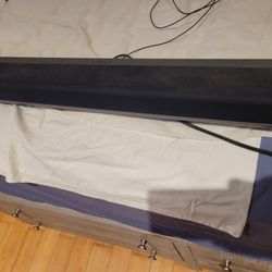 Sonos Playbar mountable wireless soundbar designed for TV and music, featuring nine amplified speakers