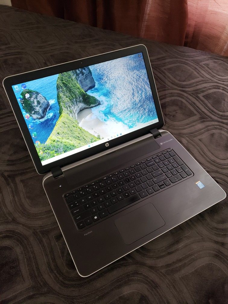 A BIG 17.3"inch Intel Core i3 Beatsaudio HP Laptop, 8GB RAM, 500GB HDD, Inbuilt Bluetooth, HDMI, DVD, SD Card Reader And a WebCam. Windows Installed.